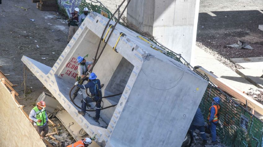 Tren Interurbano: Retiran dovela que cayó en Observatorio sobre dos autos