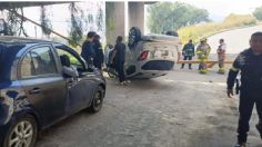 Fuerte accidente en Avenida López Portillo: automóvil cae desde un puente vehicular y mujer sobrevive de milagro