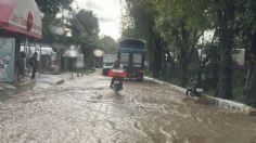 IMÁGENES FUERTES: corriente de agua arrastra a niño en Atlixco, Puebla