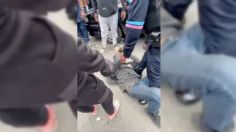 Sujeto intenta robar moto, pero es alcanzado y golpeado por comerciantes