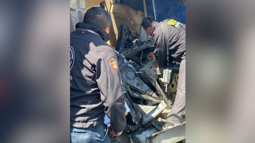 Encuentran en Edomex la bodega donde guardaban autos robados y los desmantelaban