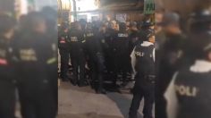 IMÁGENES FUERTES: Trifulca entre policías y miembros de una agrupación termina con 18 detenidos