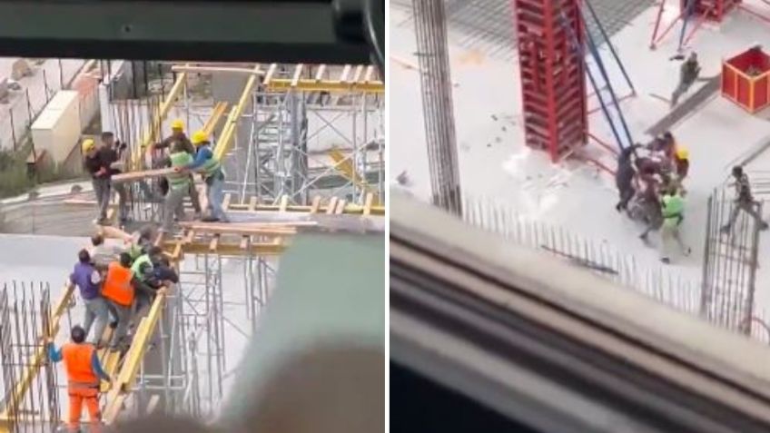 Captan pelea campal de albañiles en lo alto de una construcción: VIDEO