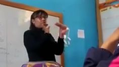 VIDEO: maestra genera polémica en redes al enseñar a poner un condón con la boca