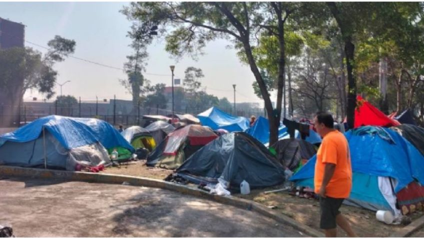 Riña en campamento migrante sobre avenida 100 metros, deja tres heridos