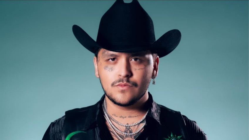 Christian Nodal es hipnotizado en una fiesta por John Milton y termina tirado en el suelo