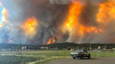 IMÁGENES FUERTES: evacúan a más de 8 mil personas por incendio forestal