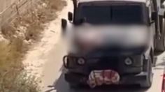 Palestino es atado a Jeep