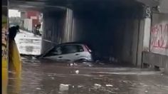 VIDEO: intentan rescatar a automovilista que quedó dando vueltas tras fuertes lluvias en Tecámac