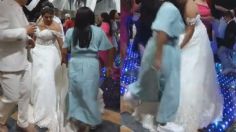 ¿Tía o hater? Mujer se hace viral por pisarle el vestido de novia a su sobrina, ¡la mandó a sentarse! | VIDEO