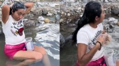 Joven se queda sin agua en su casa y se va a bañar al Río Santa Catarina en NL: VIDEO