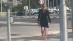 VIDEO mujer ataca con un hacha a un guardia de seguridad; mató a su hijo y perro antes