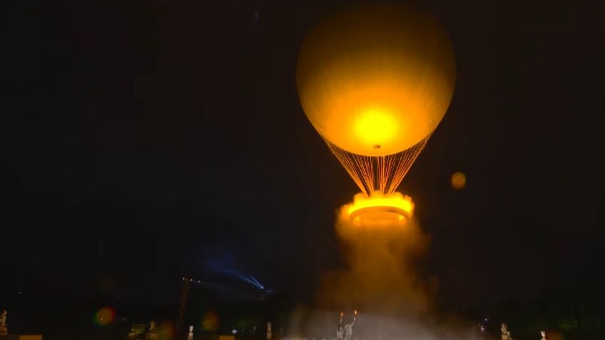 El momento en que atletas franceses encendieron la llama olímpica en París que se elevó por los aires: VIDEO