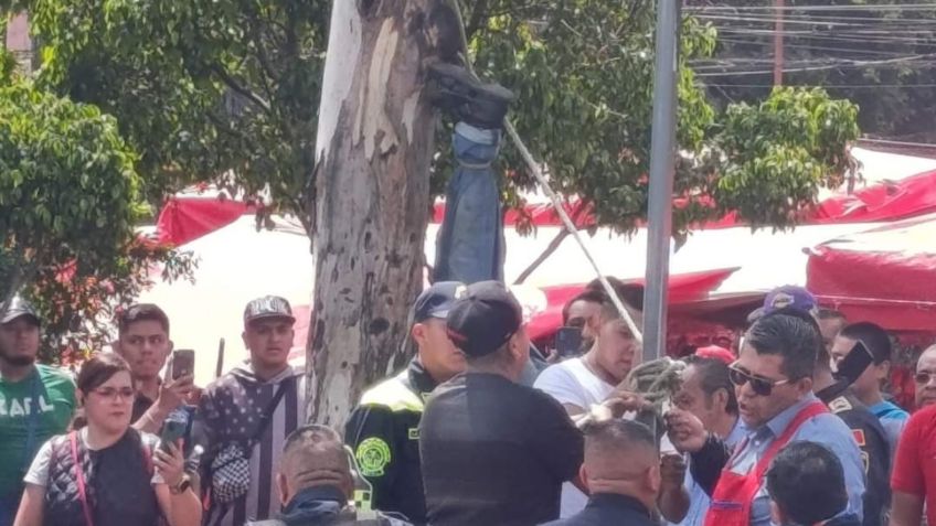 Tianguistas intentan linchar a presunto ladrón de baterías en Coyoacán; lo tenían colgado de cabeza