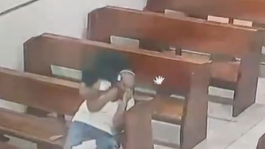 Hombre intenta asfixiar a una mujer para robarle en una iglesia: VIDEO