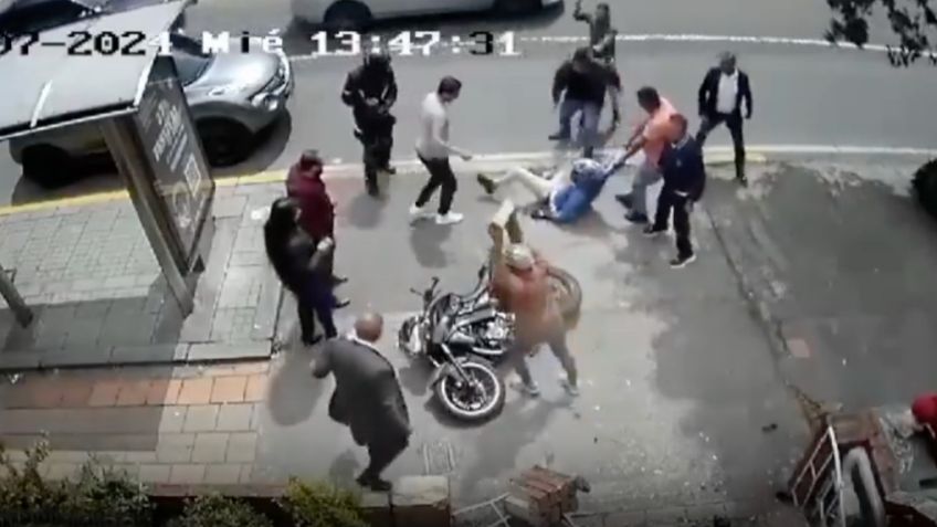 VIDEO: dan brutal golpiza a delincuente tras caer de la moto al intentar huir