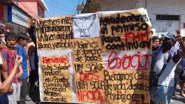 Foto que representa a Migrantes irrumpen informe de actividades en Escuintla, piden su regulación migratoria