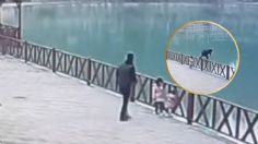 Tomaba FOTO a su hija y cae de puente hacia un lago, así fue el heroico rescate de su padre | VIDEO