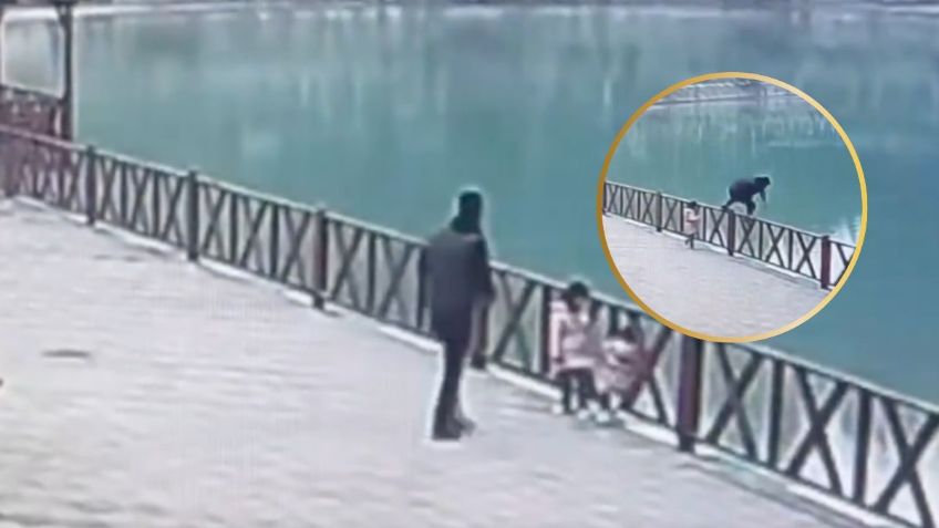 Tomaba FOTO a su hija y cae de puente hacia un lago, así fue el heroico rescate de su padre | VIDEO