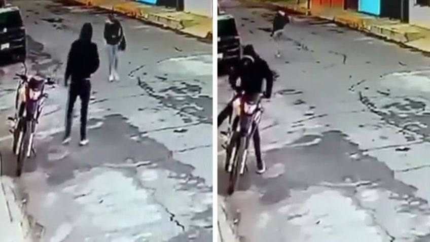 Captan VIDEO del momento exacto que delincuente en motocicleta asalta a una mujer