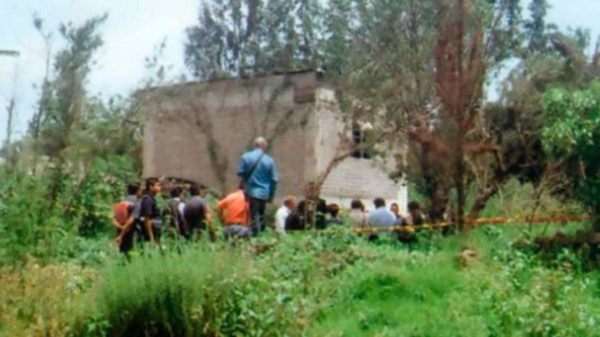 Terreno baldío en donde fueron hallados los cuerpos. FOTO: PGJCM